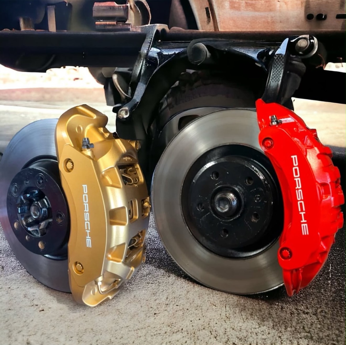 Gold and red painted Porsche calipers