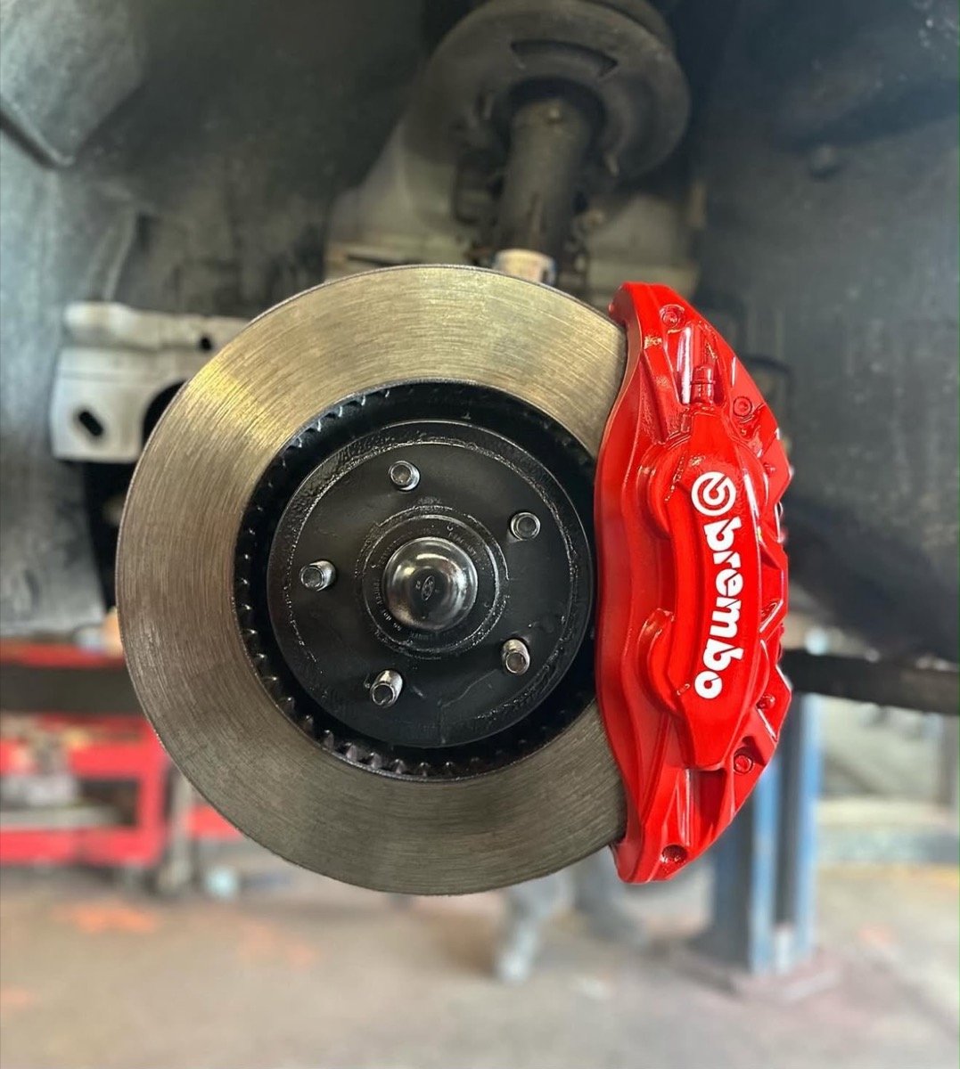 Red Brembo brake caliper
